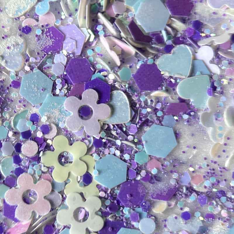NAGAIA Fantasy Flor dip powder — purple shaped glitter nail color swatch