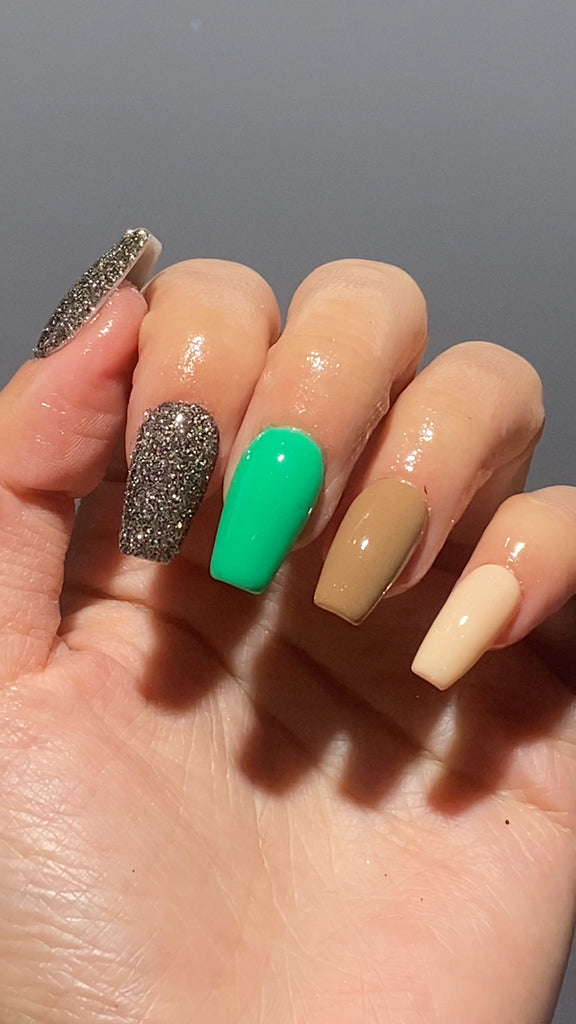 Earthy Elegance Dip Powder Manicure A Chic Mixed Palette Nail Design for Any Occasion