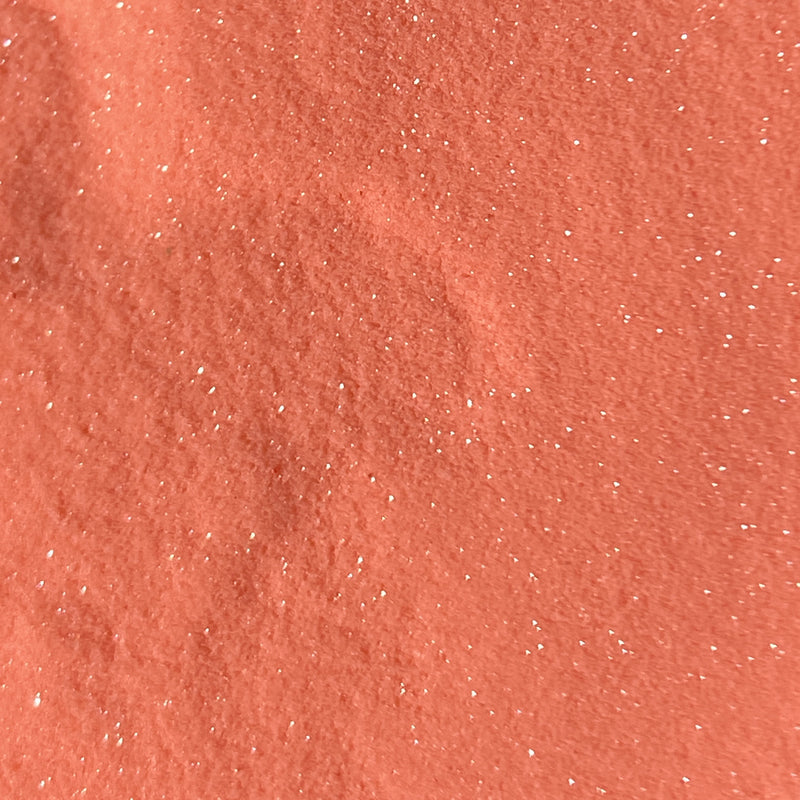 NAGAIA Sunkissed Coral dip powder — orange fine shimmer nail color swatch