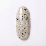 NAGAIA Oat Milk Crumble dip powder — white mixed glitter nail color swatch